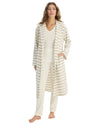 Woman wearing a striped robe and pajama set