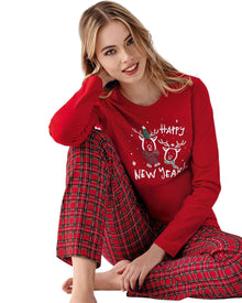  Woman wearing a red 'Happy New Year' pajama set with plaid pants