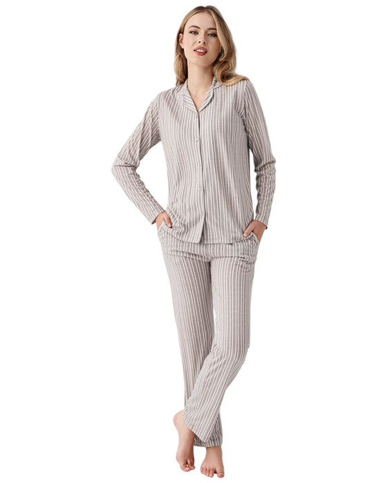 Woman wearing a striped pajama set 