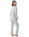 Woman wearing a striped pajama set 