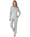 Woman wearing a striped pajama set 