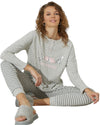 Woman wearing a gray pajama set with good morning print