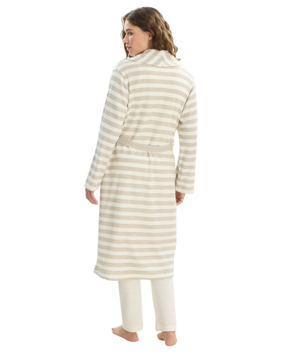 Woman wearing a long, striped robe 