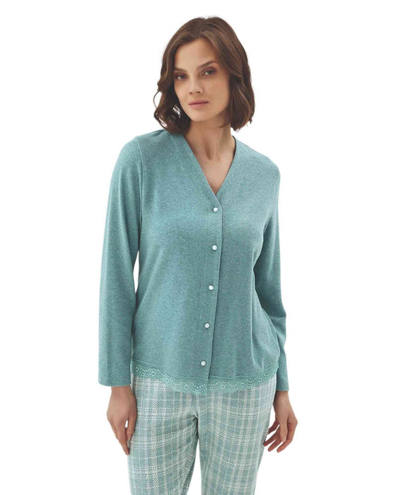 Woman wearing a teal cardigan and checkered pants 