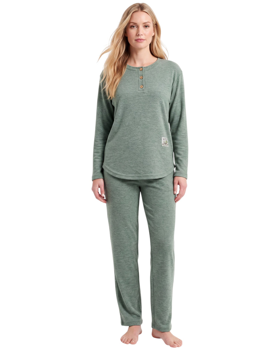 A woman modeling a two-piece heather sage green pajama set, featuring a long-sleeve henley top with three buttons and matching straight-leg pants