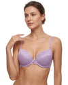 Woman wearing a purple patterned bra