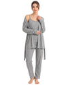 A woman modeling a light gray two-piece loungewear set consisting of a tank top with shoulder cutouts, a matching long-sleeve open-front cardigan, and matching jogger pants