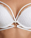 Close-up White lace bra on awomen's chest