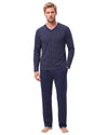 A man modeling a two-piece navy blue pajama set, featuring a long-sleeve V-neck shirt with a fine grid pattern and matching long pants,