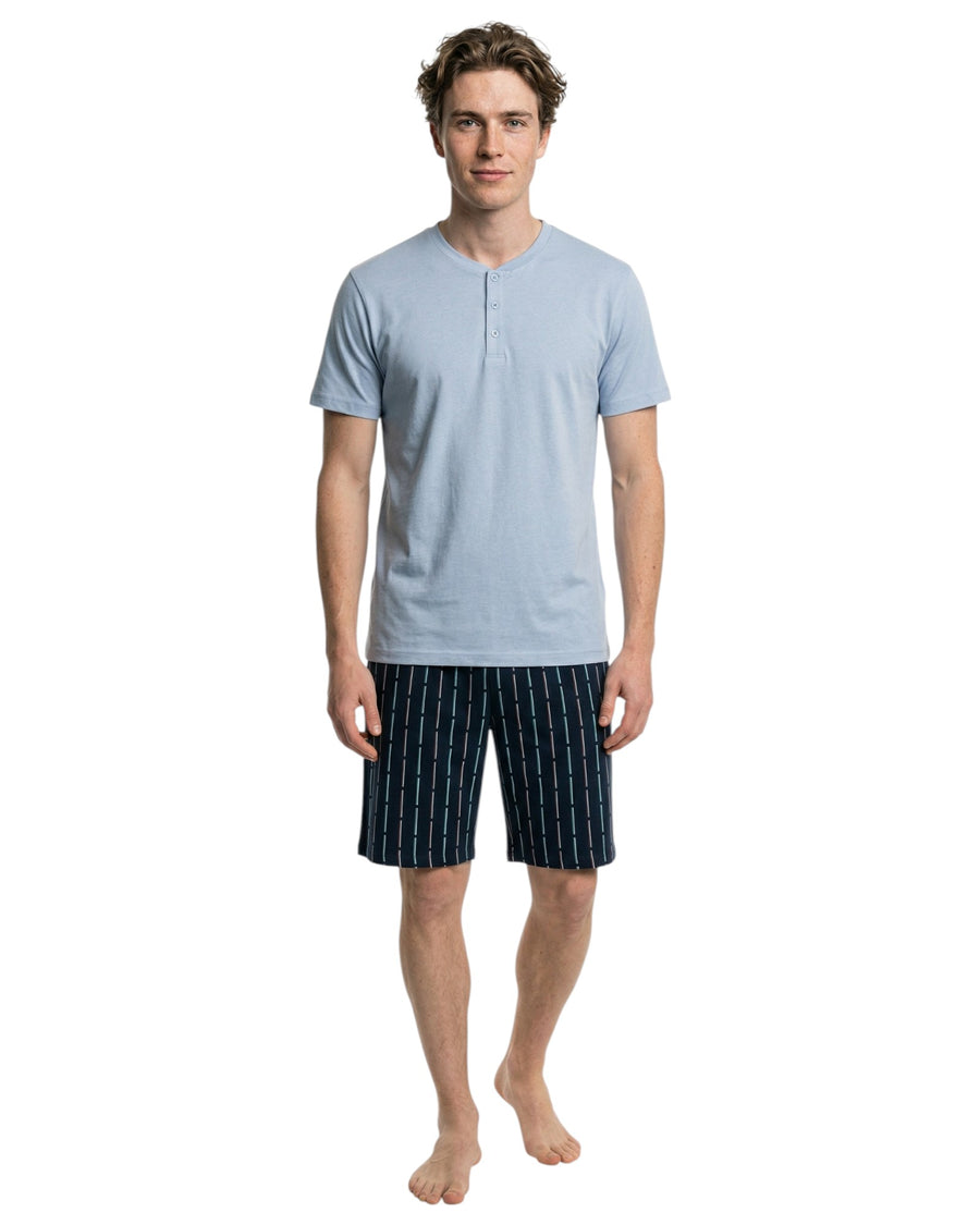 Men wearing light blue t-shirt with striped shorts