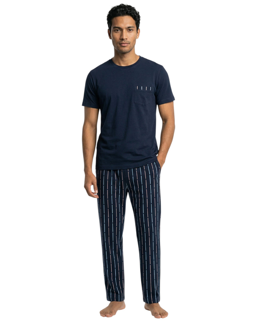 men wearing navy short sleeve pajama set with long striped pants