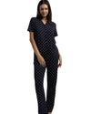 Woman wearing a navy printed pajama set, t-shirt with long pants