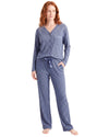 A woman modeling a two-piece heathered blue pajama set consisting of a long-sleeve button-front top and matching drawstring pants
