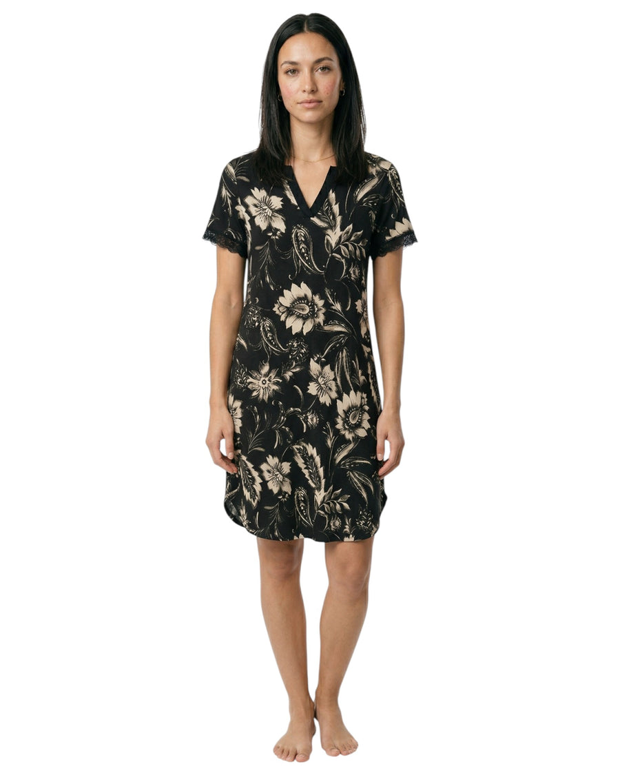 Woman wearing a black floral dress 