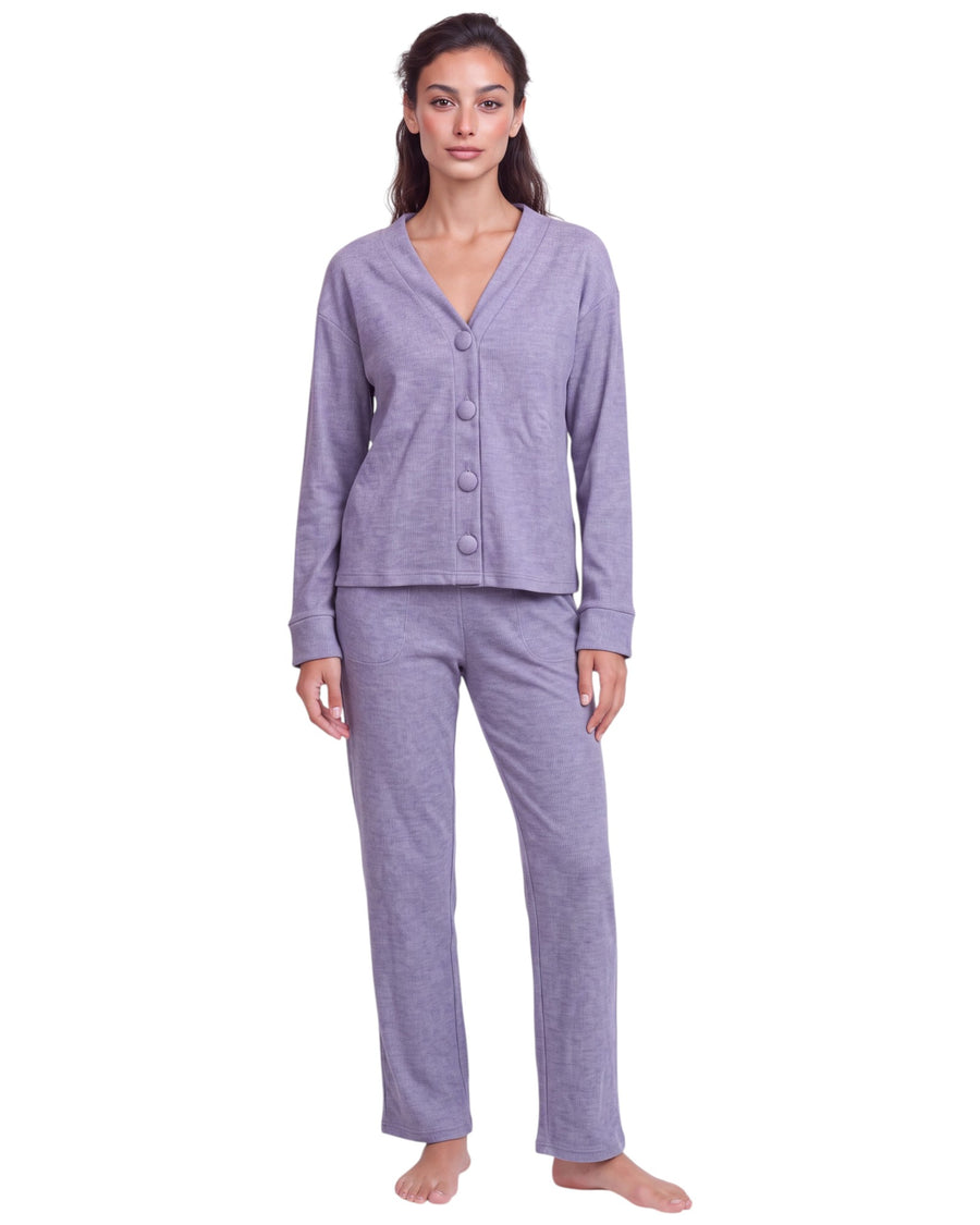 A woman modeling a two-piece heathered lavender pajama set consisting of a long-sleeve button-front top and matching pants