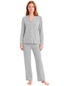 Woman wearing a grey dots pajama set long sleeve 