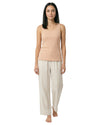 women's wearing nude top with beige long pants