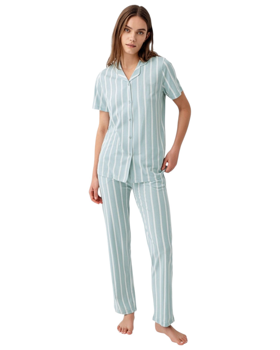 Woman wearing a striped pajama set 