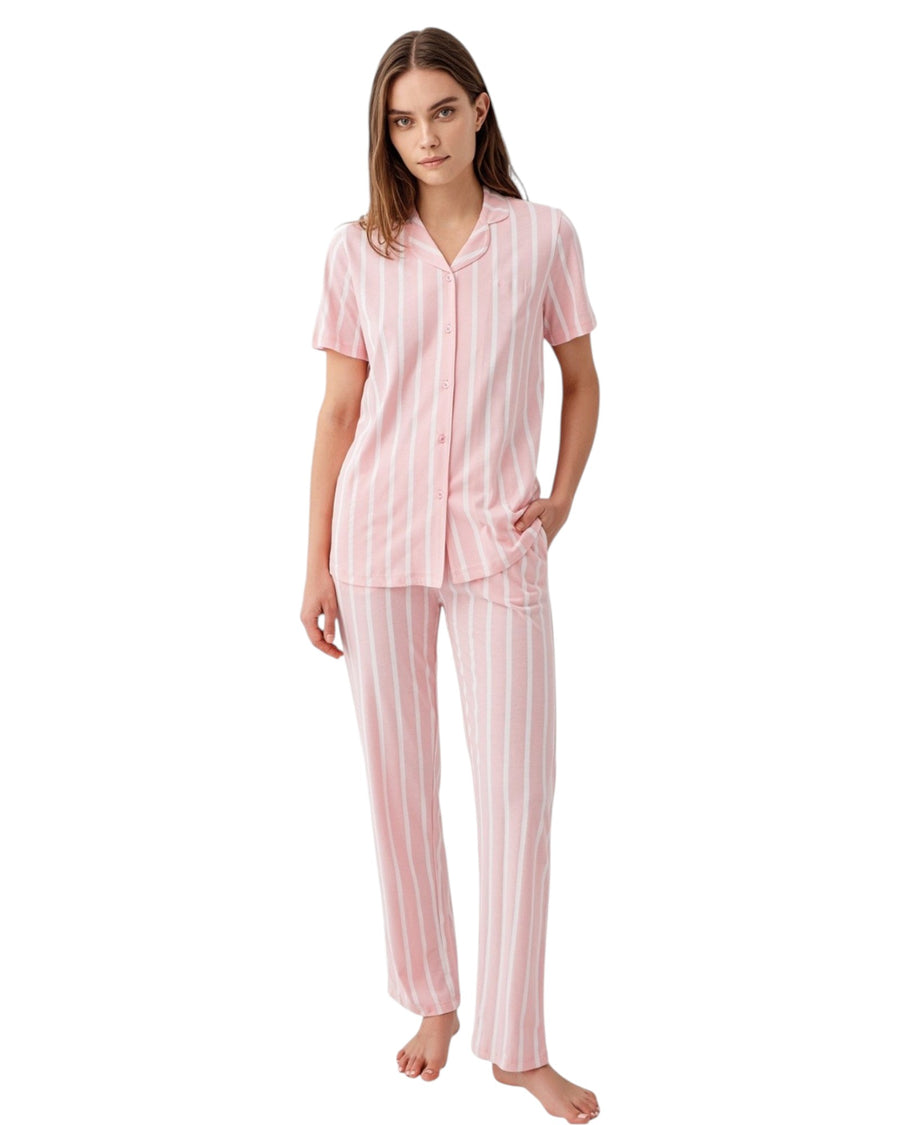 Woman wearing pink striped pajamas long set