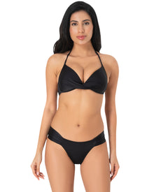  Model wearing a black halter bikini with twist-front top and ruched side bikini bottoms