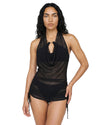 Woman wearing a black sheer mesh halter swim cover-up dress