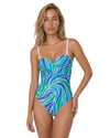 Woman wearing a blue and green swirl print one-piece swimsuit with adjustable straps and twist-front bust detail