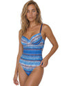 Woman wearing a blue printed one-piece swimsuit with underwired cups and adjustable straps