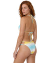 Woman wearing a pastel ombre triangle bikini set with blue and yellow gradient tones, adjustable tie straps