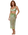 Model wearing an olive sheer print sarong cover up with a side tie detail and lightweight flowing fabric over swimwear.
