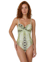 Model wearing an olive animal print twist front one piece swimsuit with adjustable straps and a sweetheart neckline.