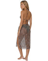 Model wearing a sheer snake print mesh sarong cover-up with a side tie detail and midi-length silhouette layered over a bikini.