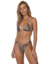 Model wearing a snake print triangle bikini set with adjustable tie straps and matching high-leg bikini bottoms.