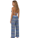 Model wearing blue chevron knit wide-leg cover-up pants with a lightweight semi-sheer shimmer fabric and elastic waistband.