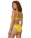 Model wearing a bright yellow underwired bikini set with adjustable straps and matching classic bikini bottoms.