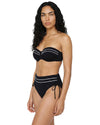 Woman wearing a black strapless bikini set with white stripe detailing, high-waisted tie-side bottoms.