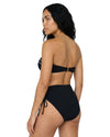 Woman wearing a black strapless bikini set with white stripe detailing, high-waisted tie-side bottoms