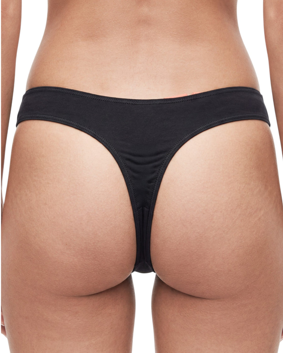 Black thong worn by a person