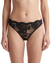 Women's black floral lace low-rise thong featuring sheer stretch lace, soft elastic edges, and minimal back coverage for a smooth, feminine fit.