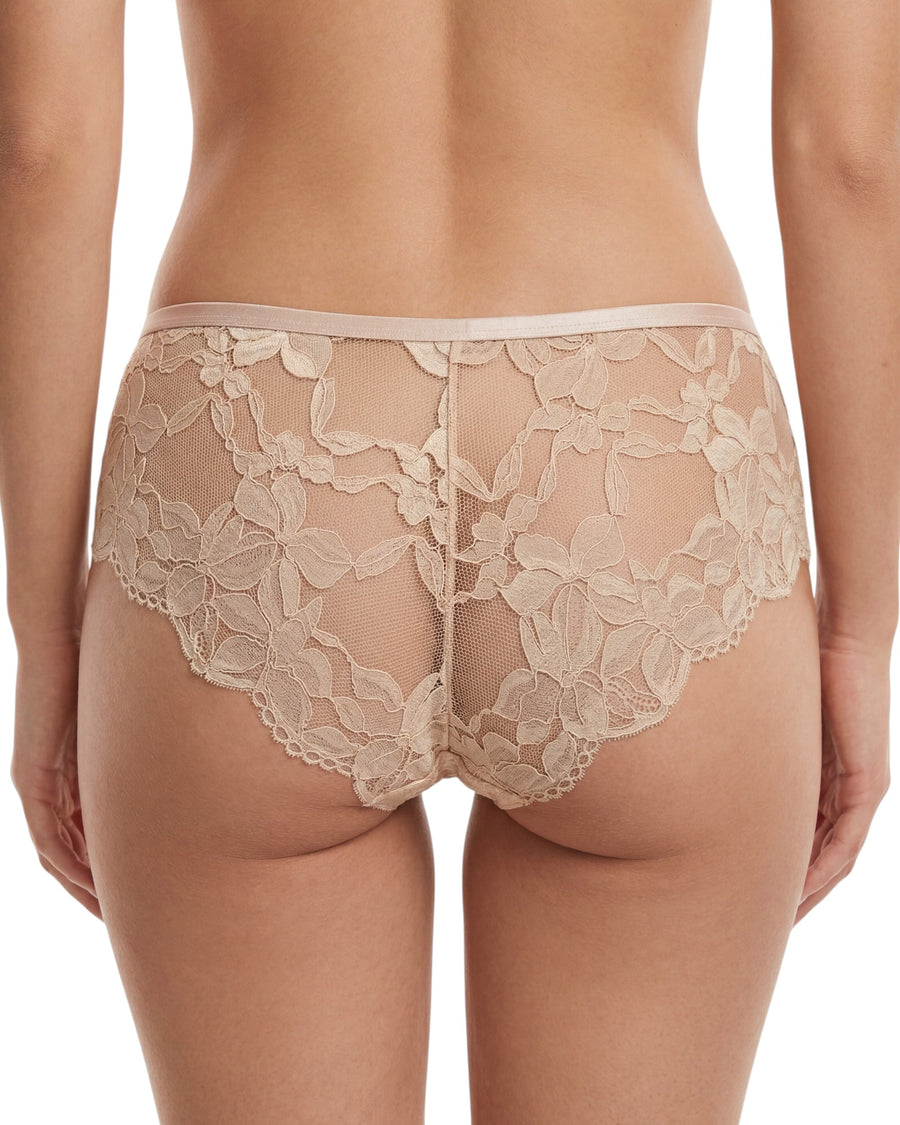 Nude polka dot brief with floral lace back detail and soft stretch fabric.