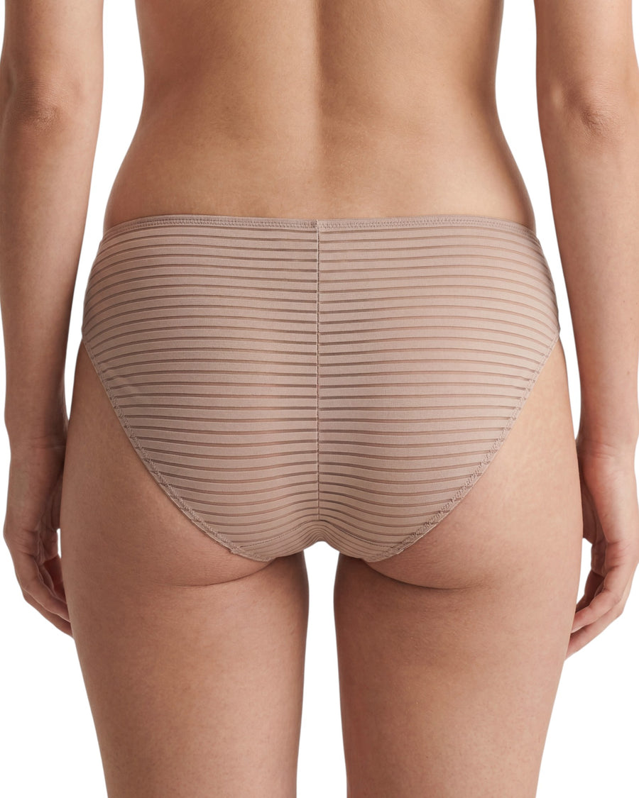 Women's beige striped bikini brief featuring a semi-sheer fabric with a delicate lace heart detail at the front and full back coverage.