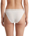 Women's white low-rise bikini brief featuring sheer striped mesh fabric, delicate lace-trimmed leg openings, and a lightweight, feminine design.