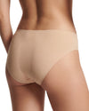 Nude seamless mid-rise brief with smooth stretch fabric and invisible finish.