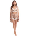 A woman modeling a two-piece satin pajama set in champagne beige with white lace trim, consisting of a short-sleeve open-front robe and matching shorts.