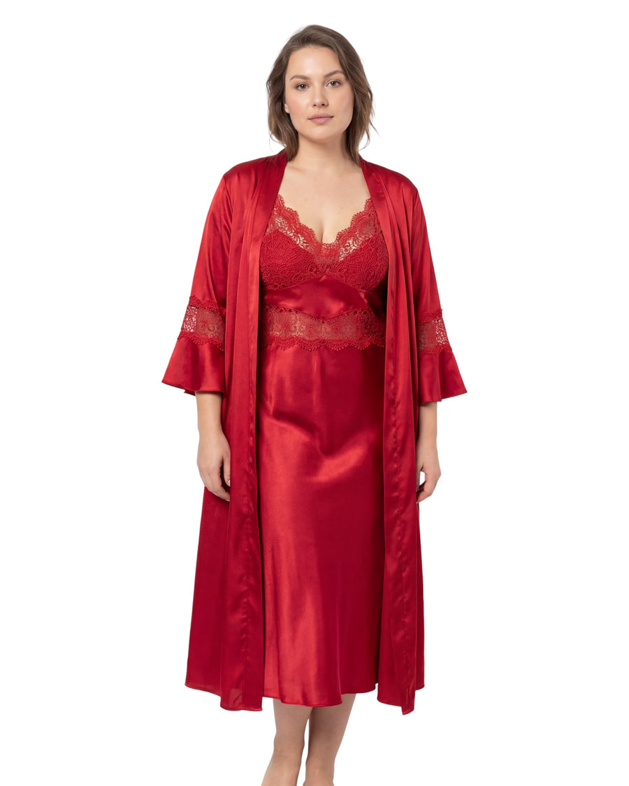 Woman wearing a red satin nightgown with lace details and matching robe on a white background