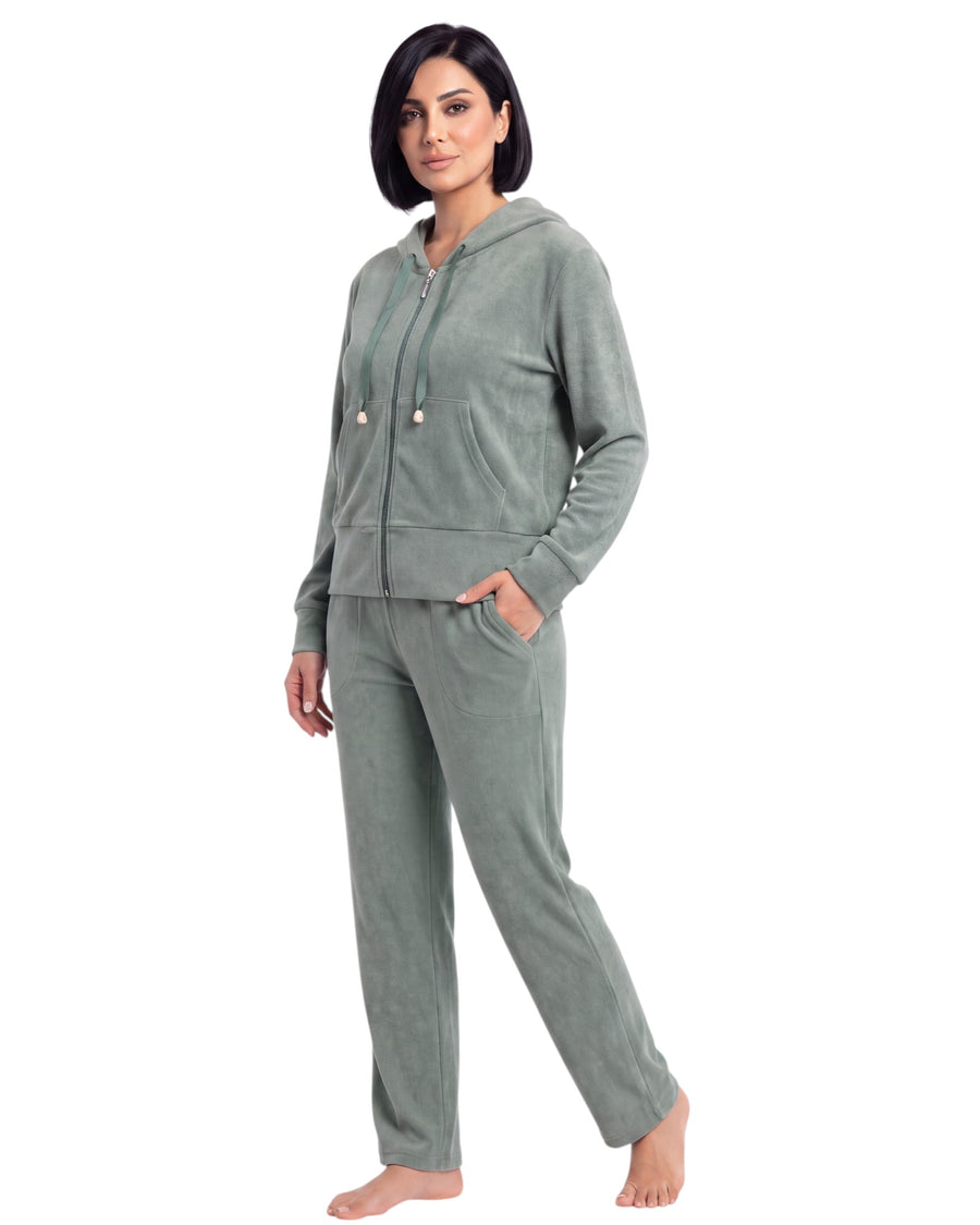 A woman modeling a matching two-piece loungewear set in a heathered sage green color, featuring a zip-up hoodie and matching pants