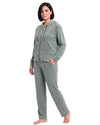 A woman modeling a matching two-piece loungewear set in a heathered sage green color, featuring a zip-up hoodie and matching pants