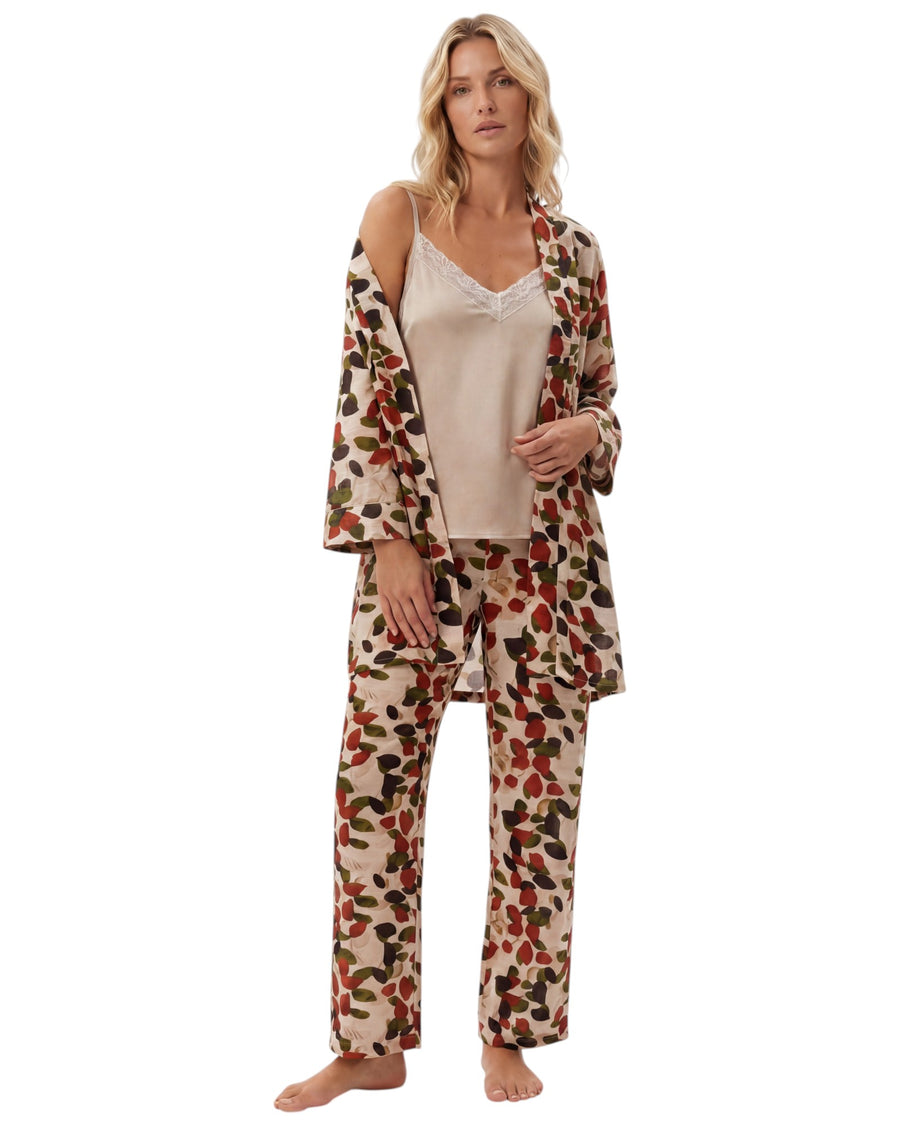 Woman wearing a 3 piece leaf pajama set 