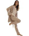 Woman wearing a beige loungewear set with lace details