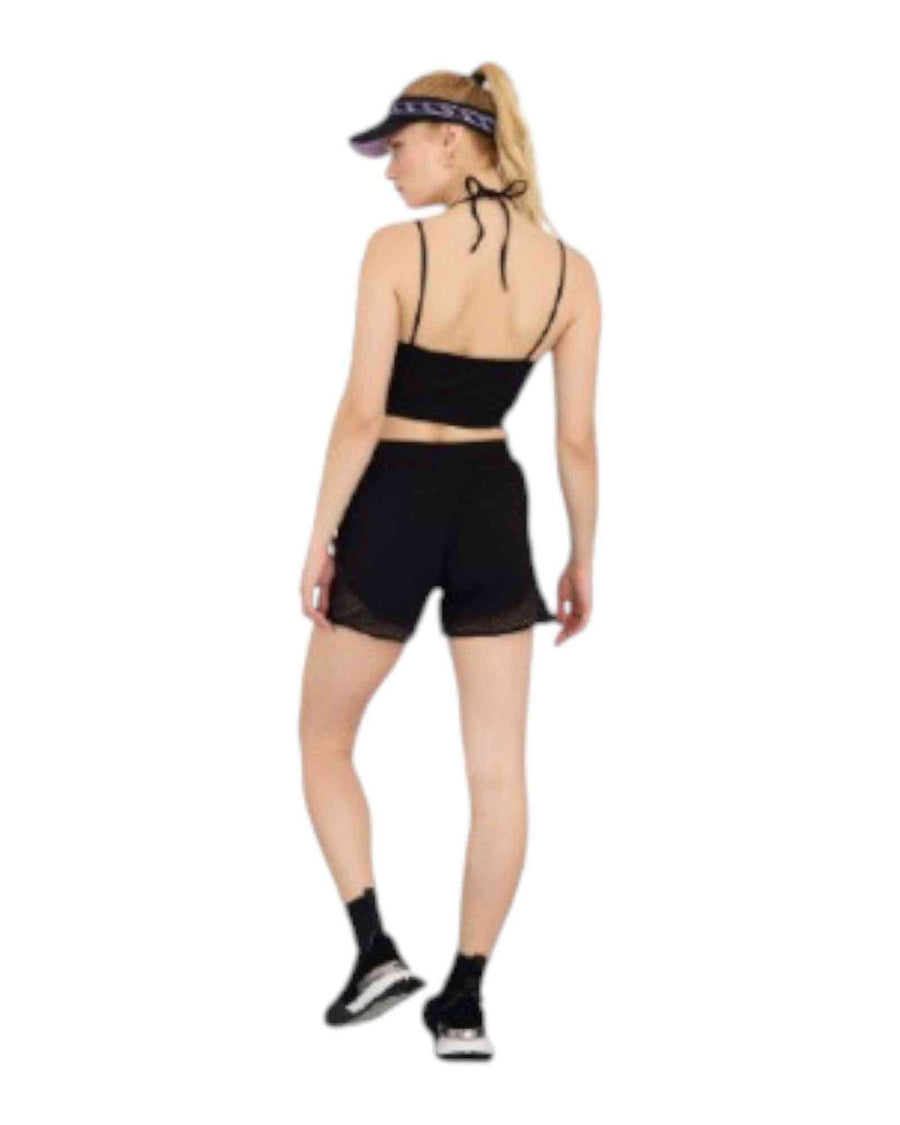 Woman wearing a black athletic outfit 