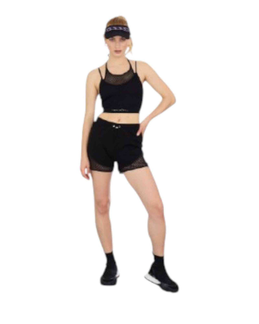 Woman wearing a black athletic outfit 